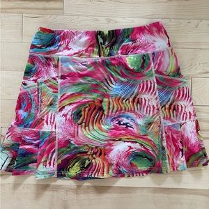 Tennis skirt with built-in shorts. Size large.